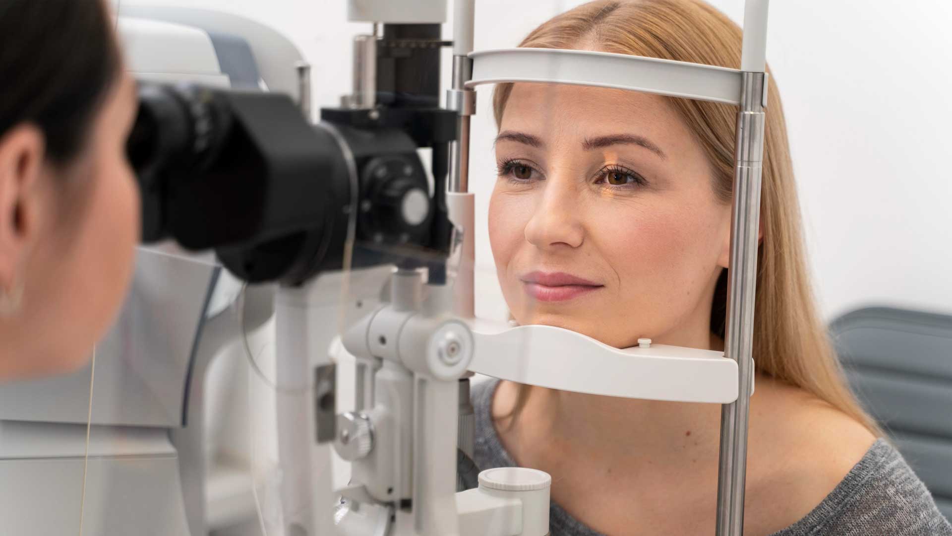Eye specialist examining a patient in a modern clinic